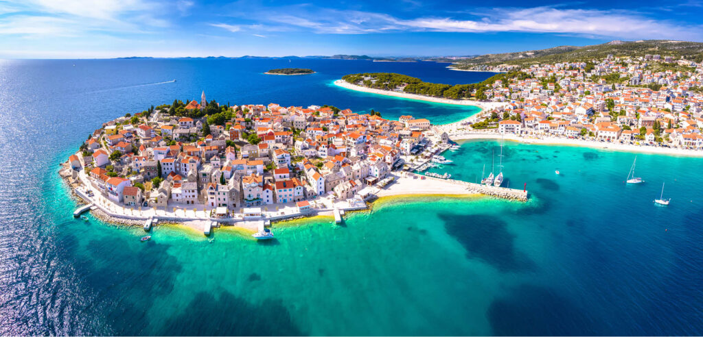 Primošten Panorama: A Breathtaking Aerial View of Coastal Serenity. Primošten is nearby town, located northwest from Trogir