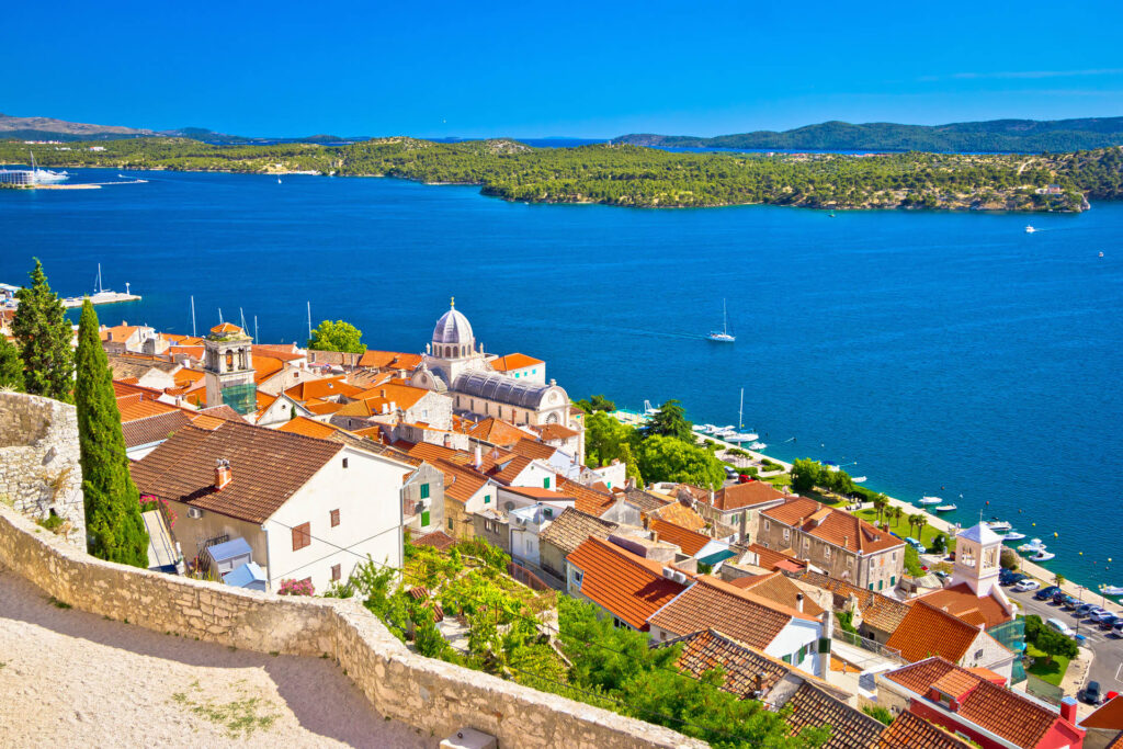Scenic aerial view of Šibenik town, a captivating nearby place of Trogir, revealing its historic beauty and coastal serenity along the Adriatic Sea.