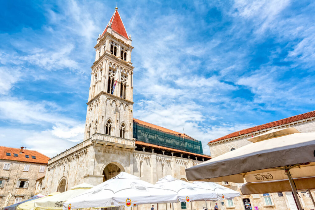 
The Cathedral of St. Lawrence, a masterpiece of Croatian medieval architecture, stands as the crowning jewel of Trogir's historic landscape. Built over several centuries, its construction began in the 13th century and continued through the 15th century.