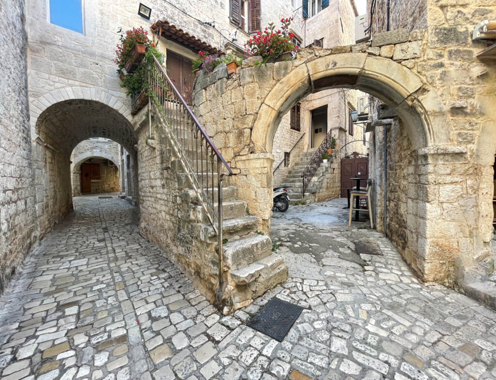 Trogir's Timeless Charm: Old streets weave through history, showcasing the town's heritage and architectural character.