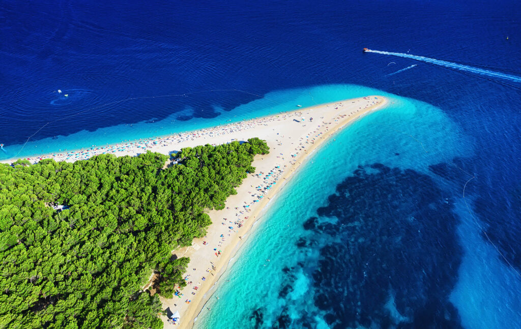Zlatni Rat Beach is near Trogir, around 90 minutes travel by car and ferry. 